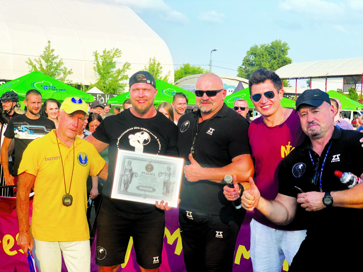 IMG_8175 Максимальна відстань тяги 5 вантажівок руками в положенні сидячи